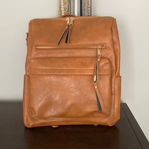Modern+chic tan leather bag with boho accessory